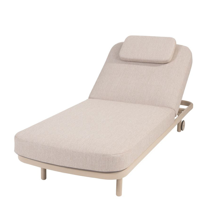 Beige lounge chair with headrest on a white background